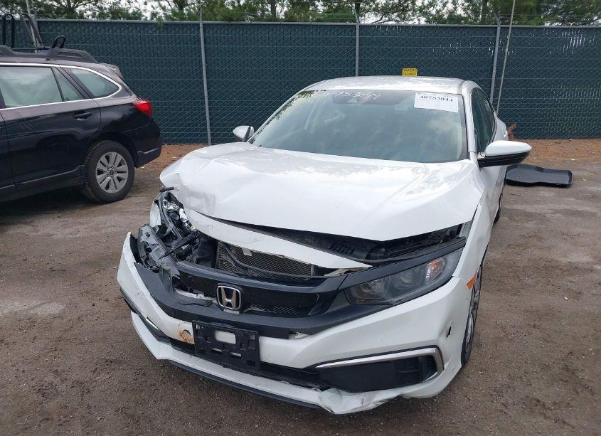 Photo 2 of 2019 Honda Civic LX (VIN 2HGFC2F66KH560758)
