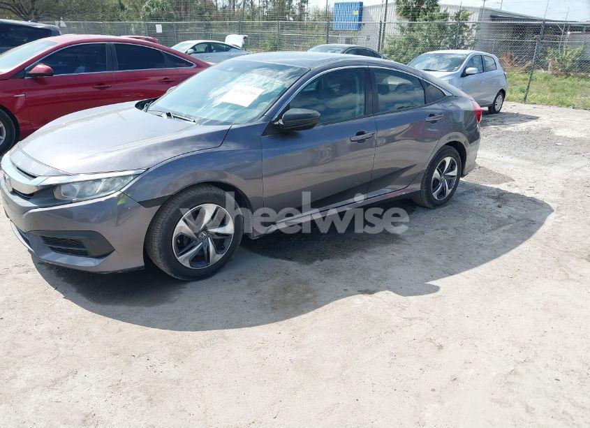 Photo 2 of 2019 Honda Civic LX (VIN 2HGFC2F66KH601700)