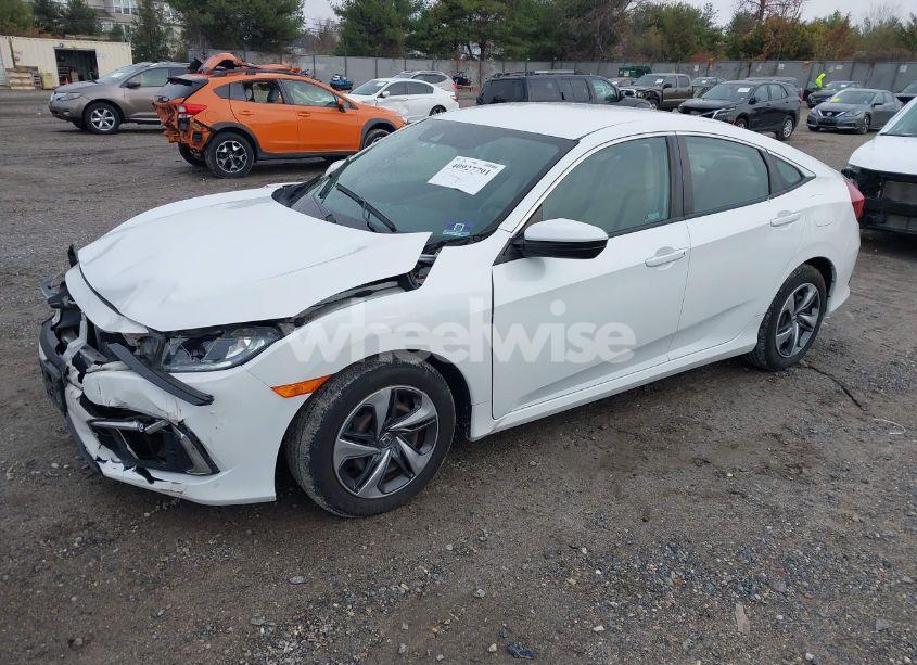 Photo 2 of 2019 Honda Civic LX (VIN 2HGFC2F69KH603554)