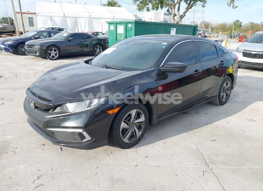 Photo 2 of 2019 Honda Civic LX (VIN 2HGFC2F6XKH509425)