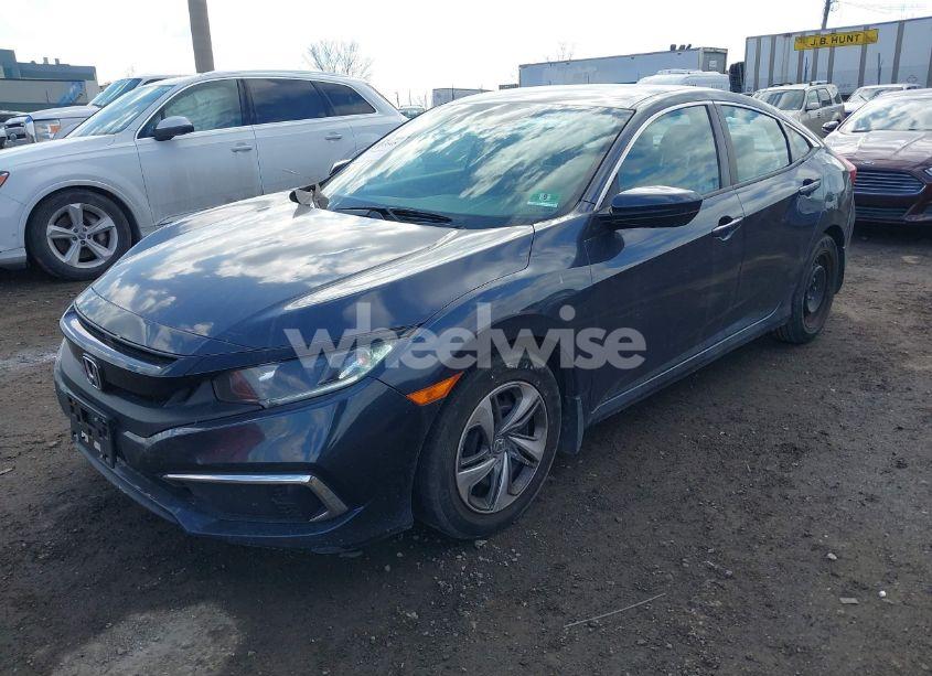 Photo 2 of 2019 Honda Civic LX (VIN 2HGFC2F6XKH523521)