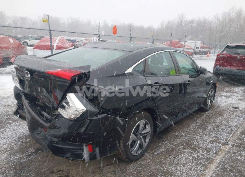 Photo 4 of 2019 Honda Civic LX (VIN 2HGFC2F6XKH529495)