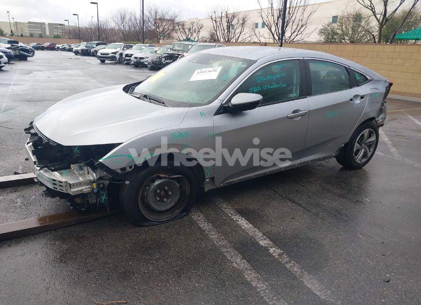 Photo 2 of 2019 Honda Civic LX (VIN 2HGFC2F6XKH531361)