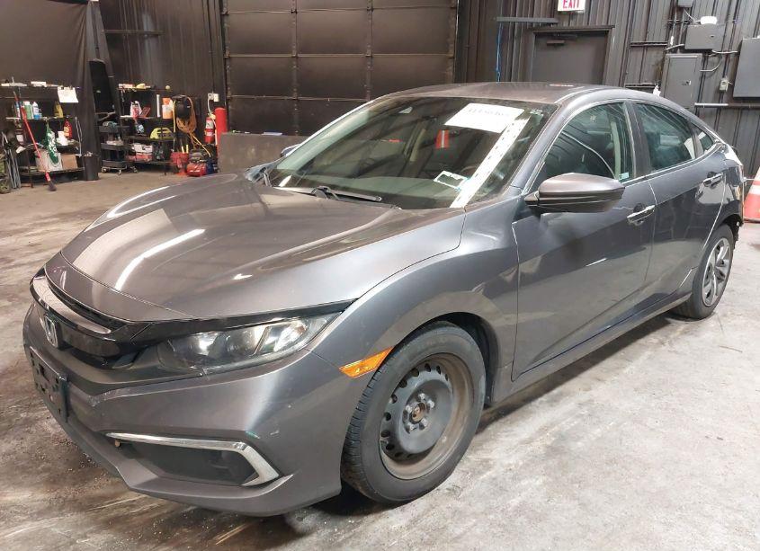 Photo 2 of 2019 Honda Civic LX (VIN 2HGFC2F6XKH557698)
