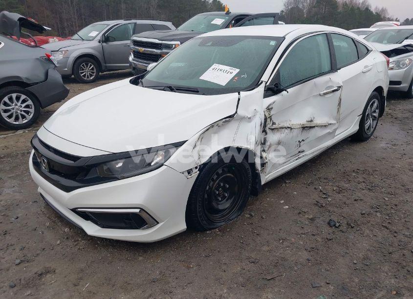 Photo 2 of 2019 Honda Civic LX (VIN 2HGFC2F6XKH560830)