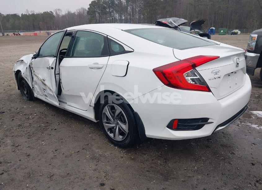 Photo 3 of 2019 Honda Civic LX (VIN 2HGFC2F6XKH560830)