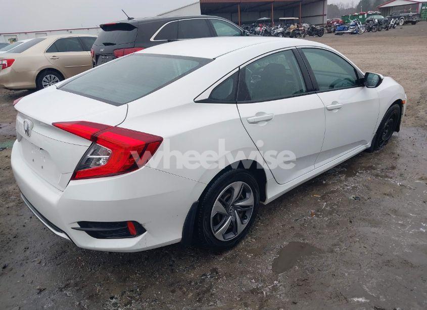 Photo 4 of 2019 Honda Civic LX (VIN 2HGFC2F6XKH560830)