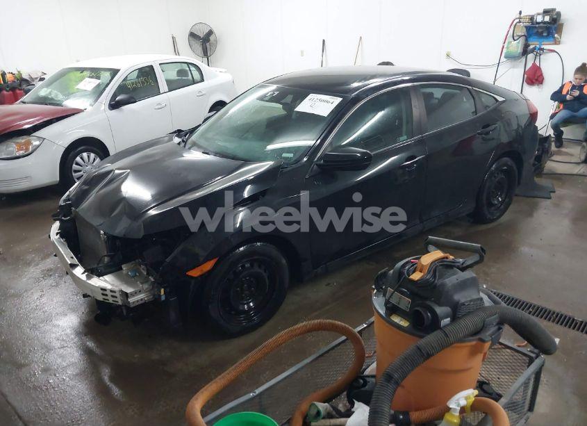 Photo 2 of 2019 Honda Civic LX (VIN 2HGFC2F6XKH565753)