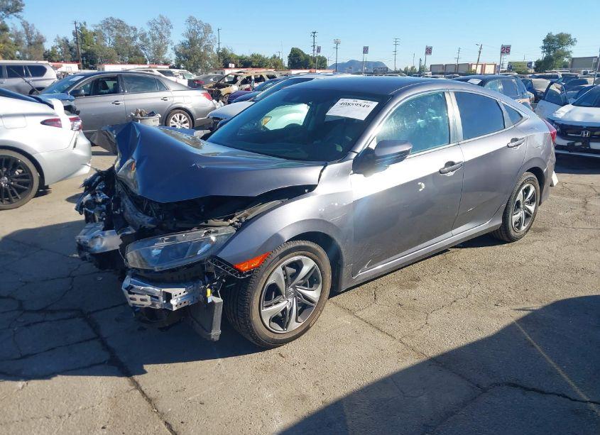 Photo 2 of 2019 Honda Civic LX (VIN 2HGFC2F6XKH589857)