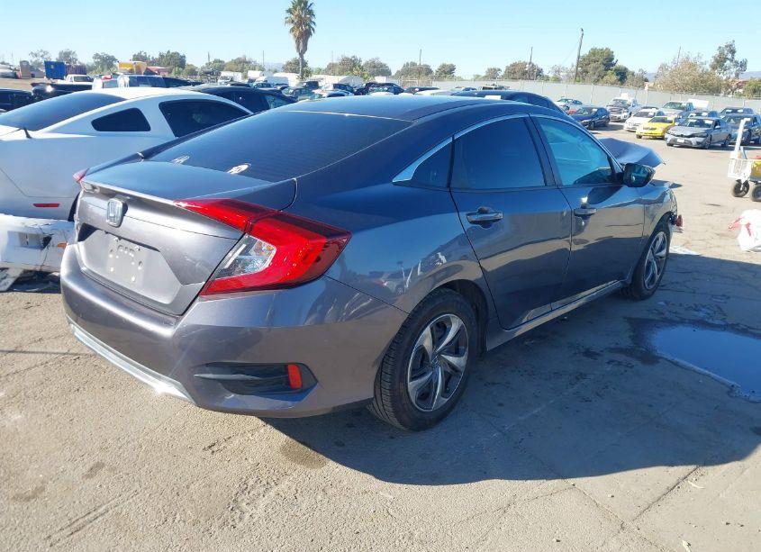 Photo 4 of 2019 Honda Civic LX (VIN 2HGFC2F6XKH589857)