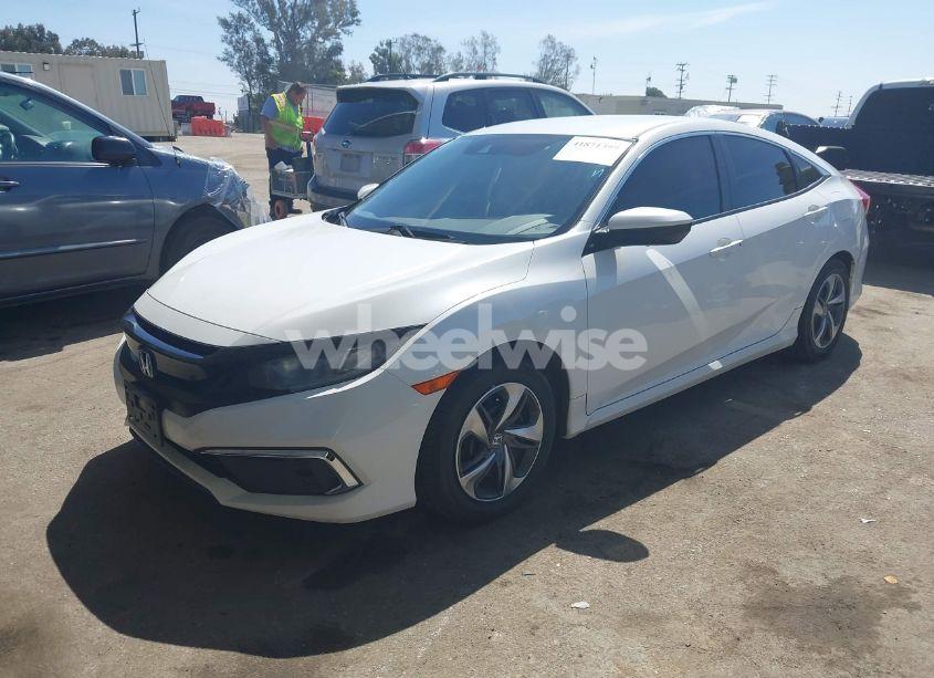 Photo 2 of 2019 Honda Civic LX (VIN 2HGFC2F6XKH600677)