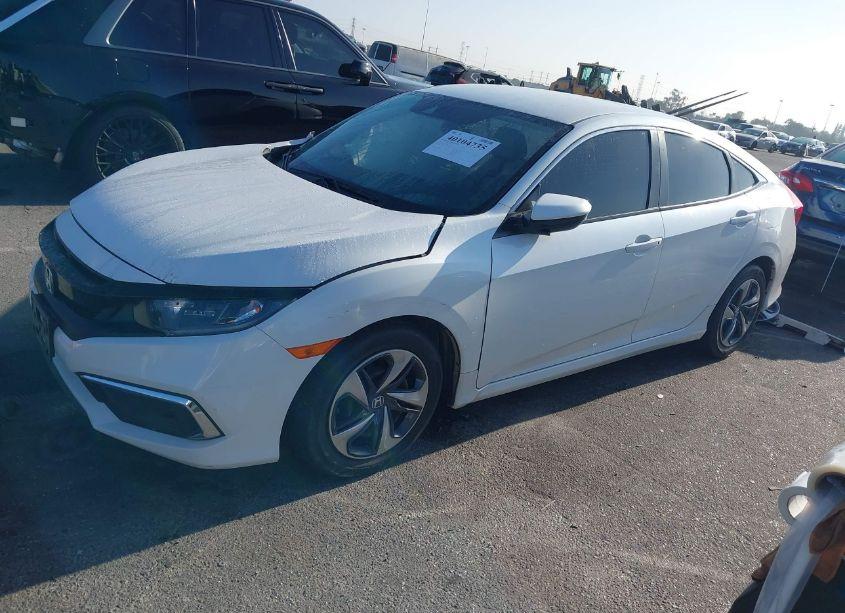 Photo 2 of 2020 Honda Civic LX (VIN 2HGFC2F6XLH517512)