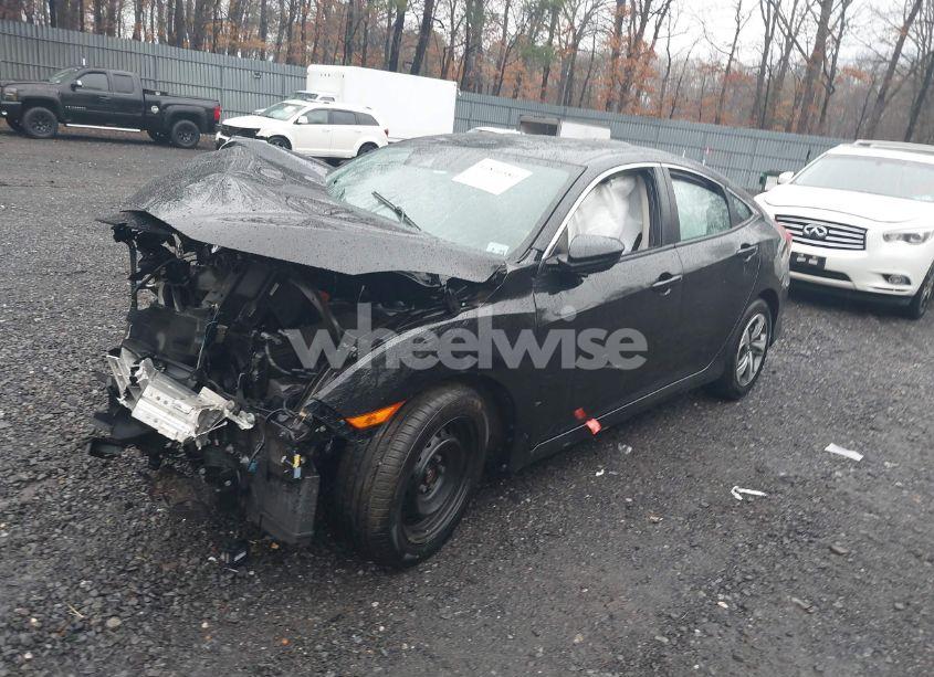 Photo 2 of 2020 Honda Civic LX (VIN 2HGFC2F6XLH531197)