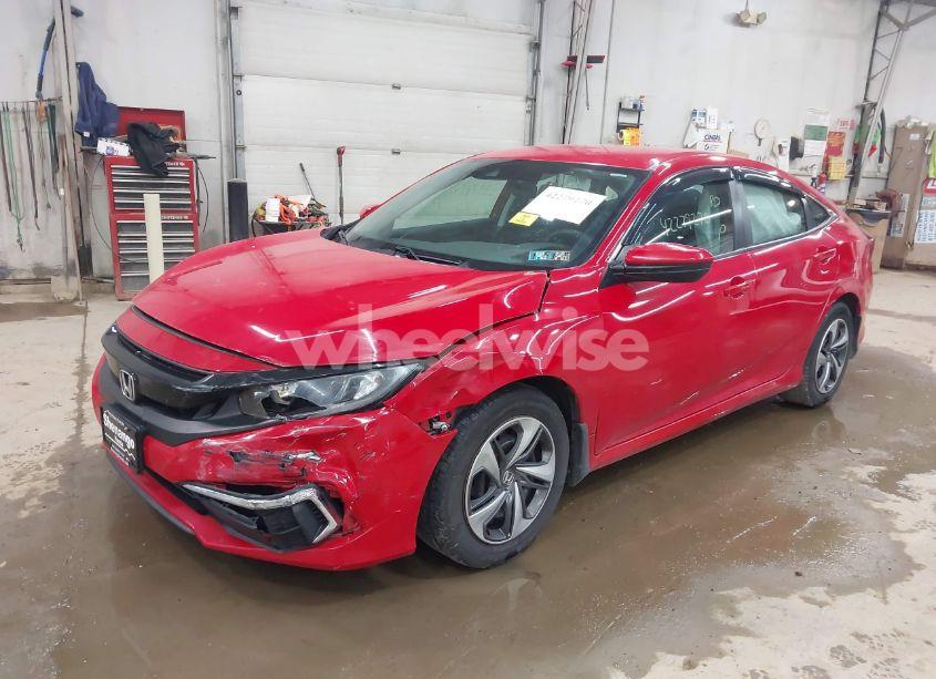 Photo 2 of 2020 Honda Civic LX (VIN 2HGFC2F6XLH551000)