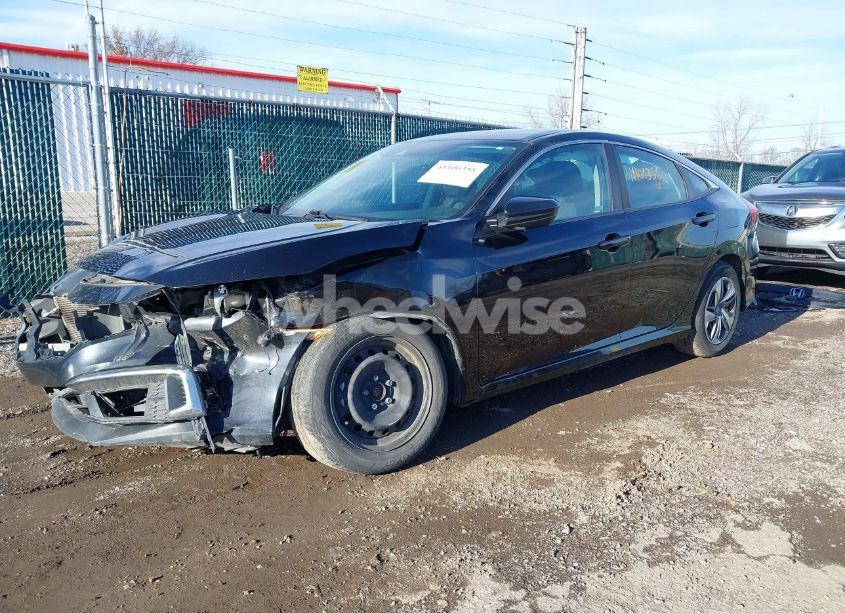 Photo 2 of 2020 Honda Civic LX (VIN 2HGFC2F6XLH553135)