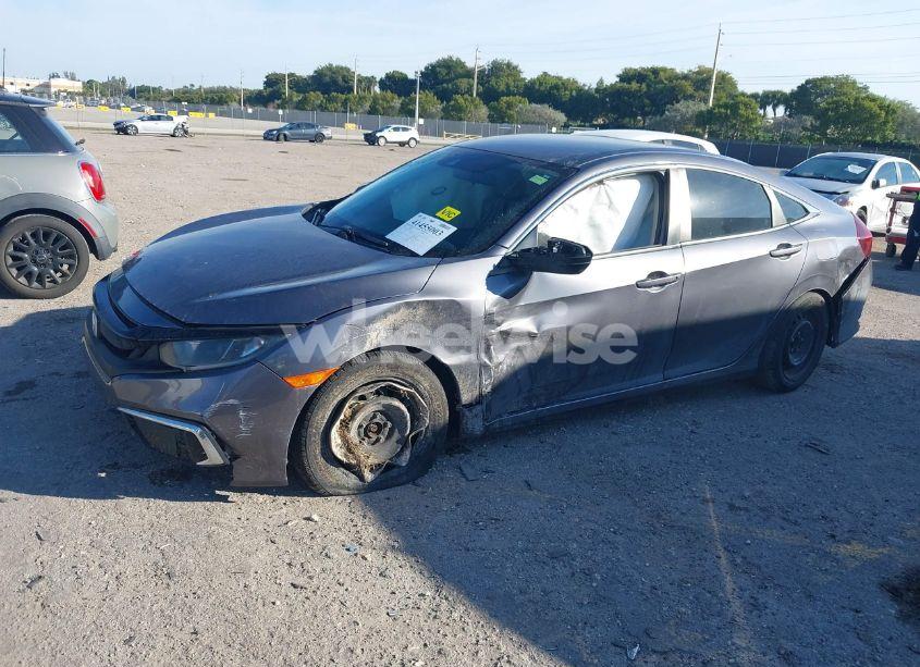 Photo 2 of 2020 Honda Civic LX (VIN 2HGFC2F6XLH556892)