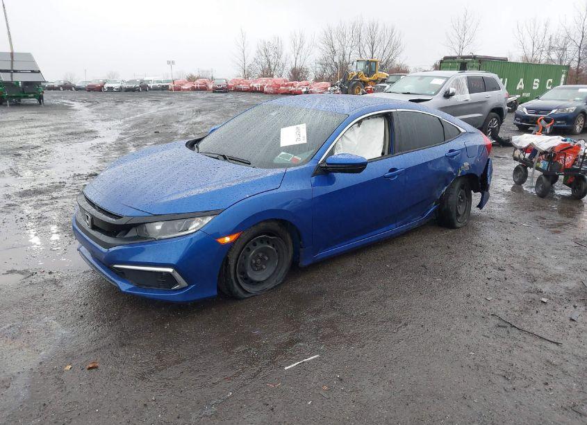 Photo 2 of 2020 Honda Civic LX (VIN 2HGFC2F6XLH560599)