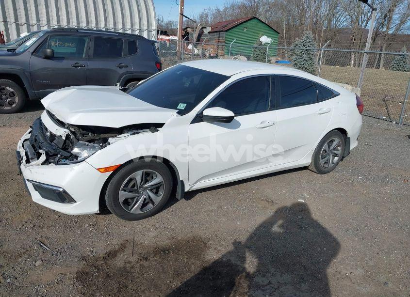 Photo 2 of 2020 Honda Civic LX (VIN 2HGFC2F6XLH560831)