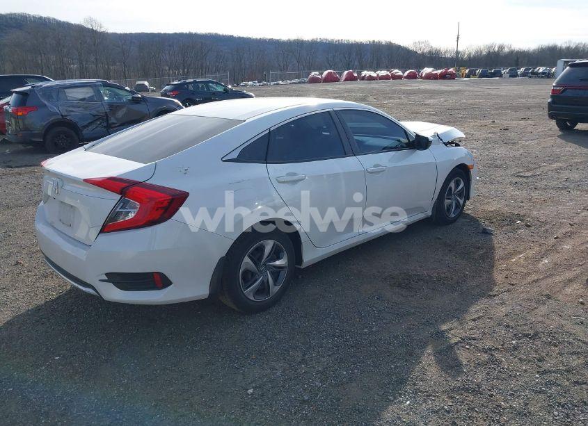 Photo 4 of 2020 Honda Civic LX (VIN 2HGFC2F6XLH560831)