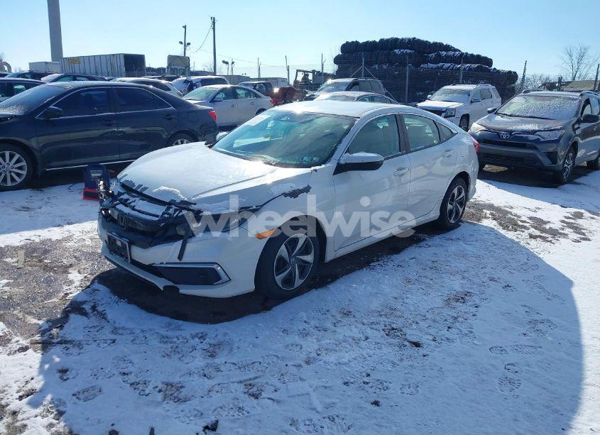 Photo 2 of 2020 Honda Civic LX (VIN 2HGFC2F6XLH583705)