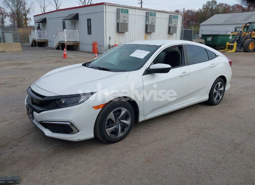 Photo 2 of 2021 Honda Civic LX (VIN 2HGFC2F6XMH502509)