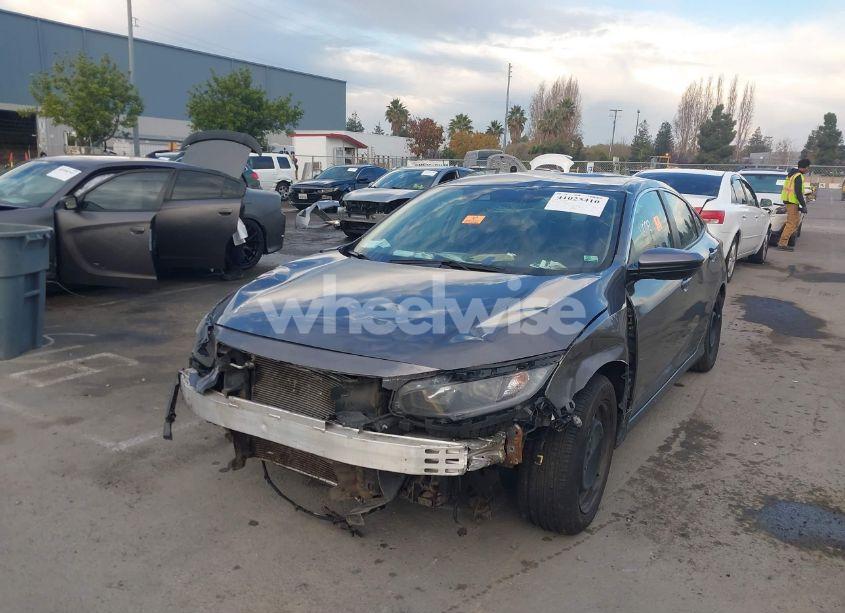 Photo 2 of 2021 Honda Civic LX (VIN 2HGFC2F6XMH509539)