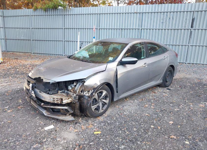 Photo 2 of 2021 Honda Civic LX (VIN 2HGFC2F6XMH517138)