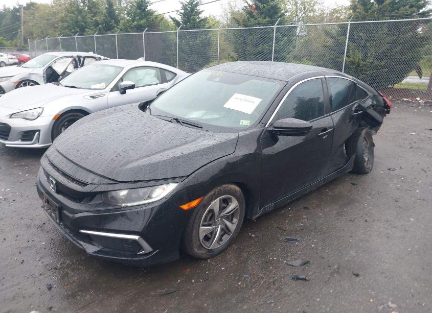 Photo 2 of 2021 Honda Civic LX (VIN 2HGFC2F6XMH524476)