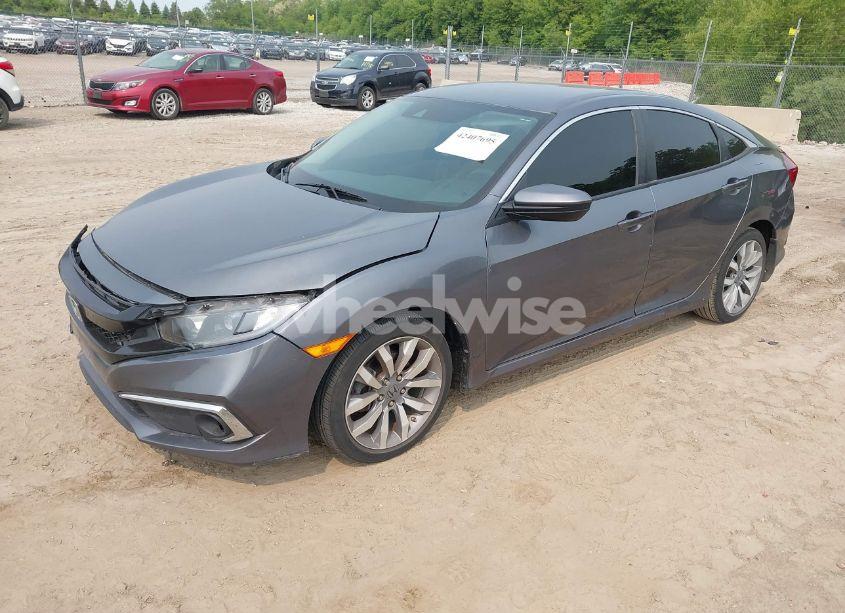 Photo 2 of 2021 Honda Civic LX (VIN 2HGFC2F6XMH531606)