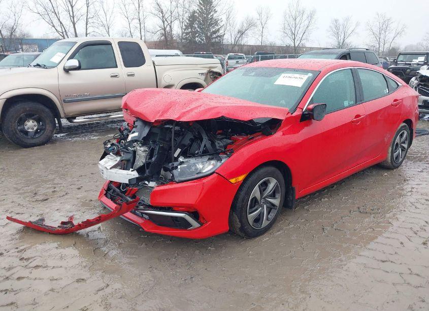 Photo 2 of 2021 Honda Civic LX (VIN 2HGFC2F6XMH533064)