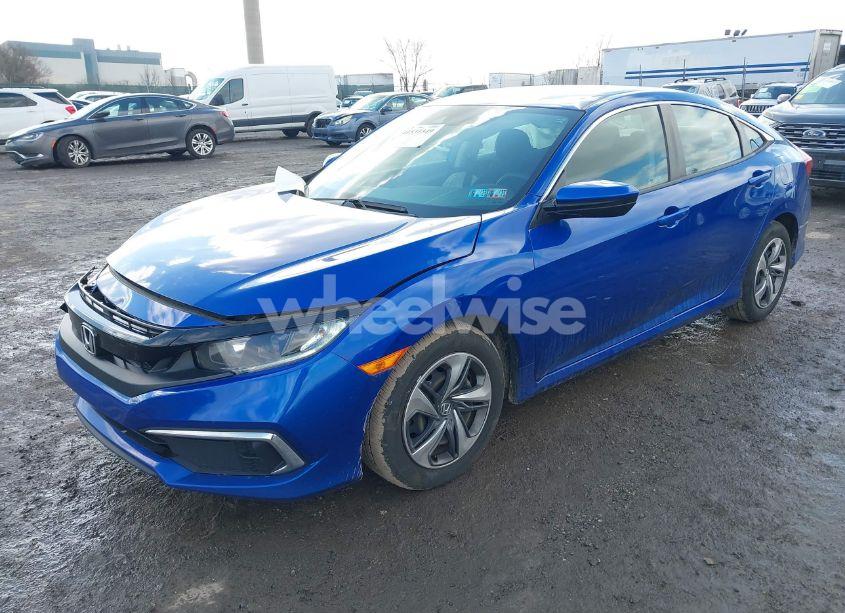 Photo 2 of 2021 Honda Civic LX (VIN 2HGFC2F6XMH540225)
