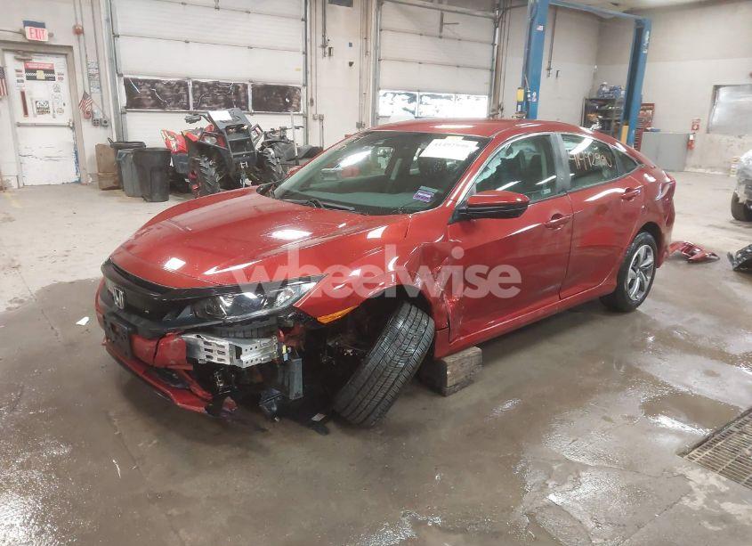 Photo 2 of 2021 Honda Civic LX (VIN 2HGFC2F6XMH547174)