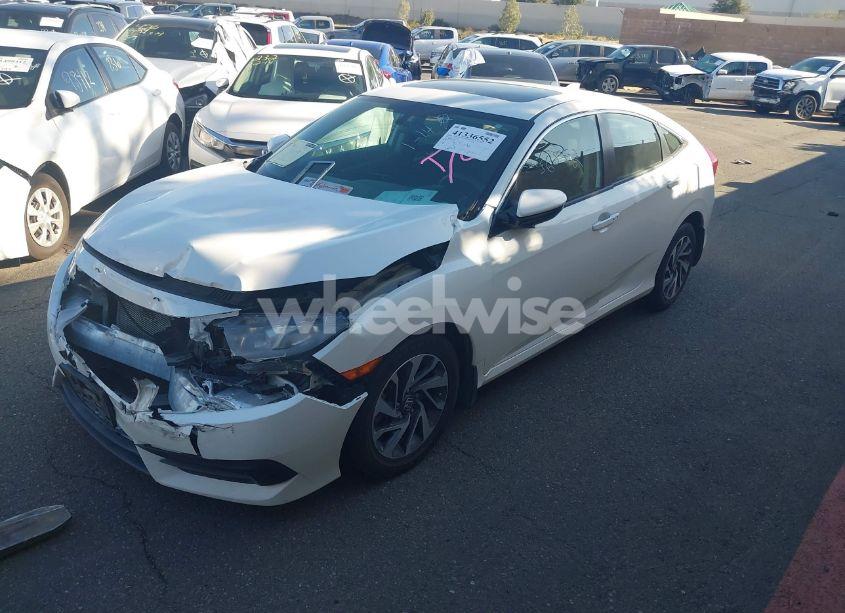 Photo 2 of 2017 Honda Civic EX (VIN 2HGFC2F71HH519813)