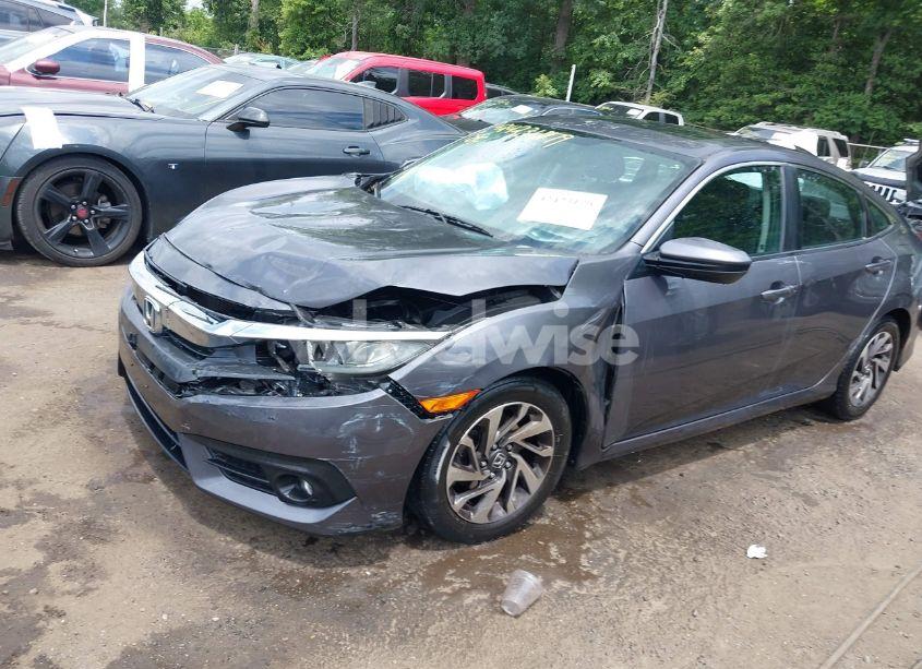 Photo 2 of 2018 Honda Civic EX (VIN 2HGFC2F71JH501947)