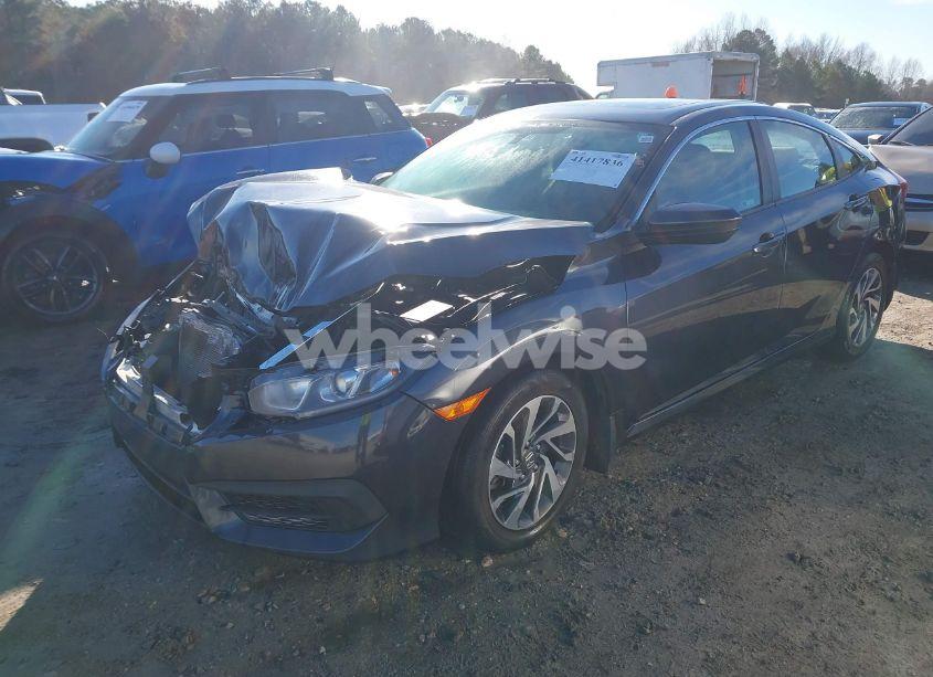 Photo 2 of 2018 Honda Civic EX (VIN 2HGFC2F72JH590248)