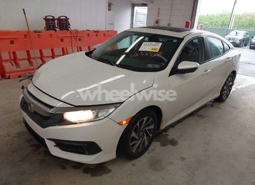 Photo 2 of 2017 Honda Civic EX (VIN 2HGFC2F73HH567054)