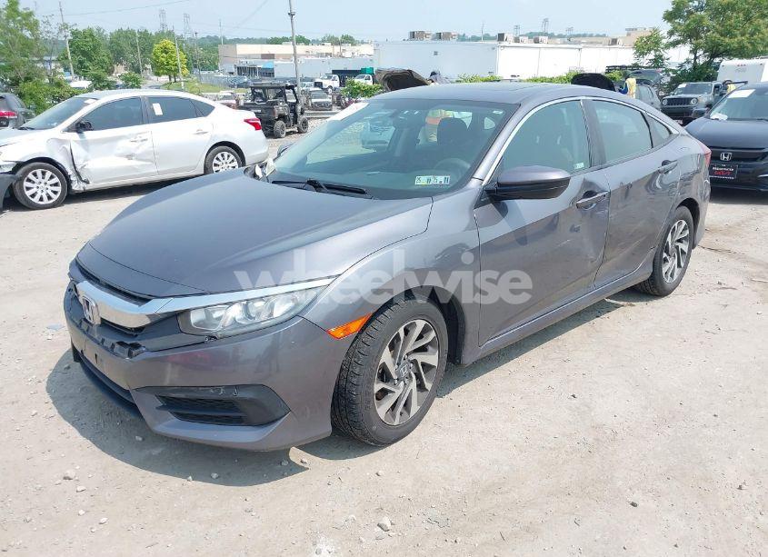 Photo 2 of 2018 Honda Civic EX (VIN 2HGFC2F74JH589988)
