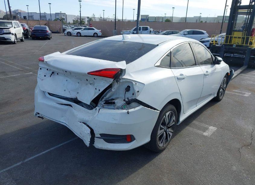Photo 4 of 2017 Honda Civic EX (VIN 2HGFC2F75HH527283)