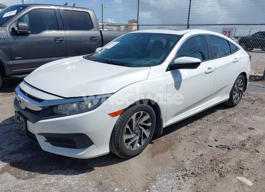 Photo 2 of 2018 Honda Civic EX (VIN 2HGFC2F75JH504611)