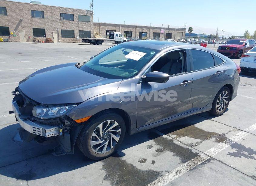 Photo 2 of 2018 Honda Civic EX (VIN 2HGFC2F75JH599994)
