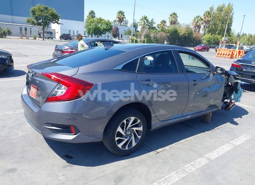 Photo 4 of 2018 Honda Civic EX (VIN 2HGFC2F75JH599994)