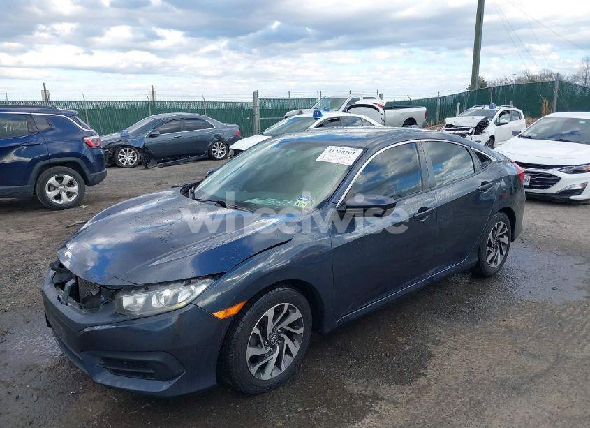 Photo 2 of 2018 Honda Civic EX (VIN 2HGFC2F75JH610590)