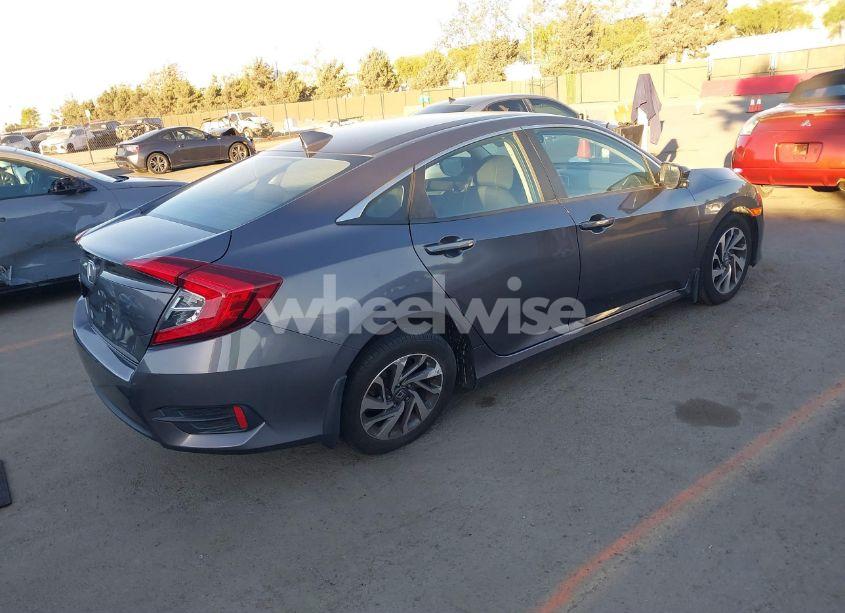 Photo 4 of 2018 Honda Civic EX (VIN 2HGFC2F76JH531767)