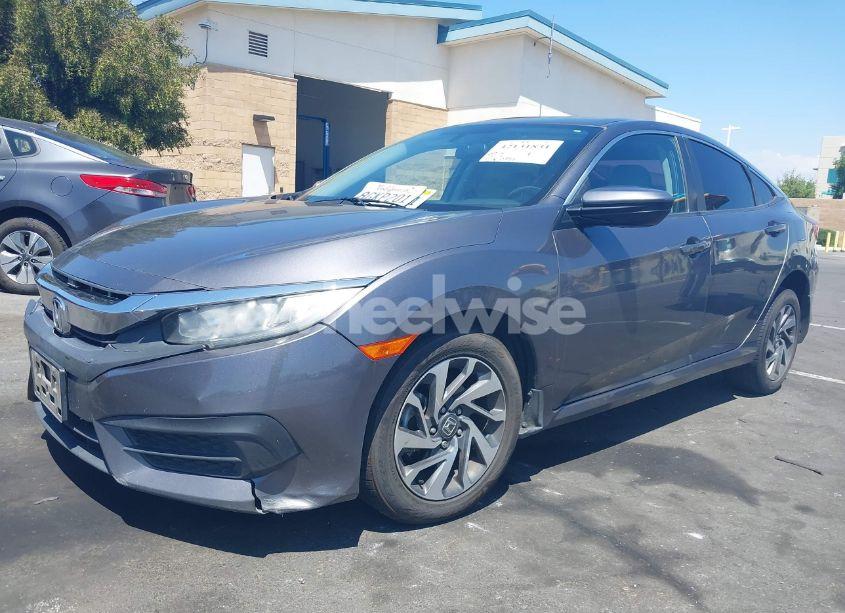 Photo 2 of 2018 Honda Civic EX (VIN 2HGFC2F76JH600117)
