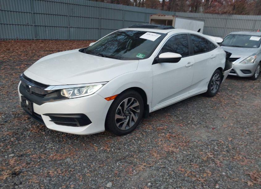 Photo 2 of 2018 Honda Civic EX (VIN 2HGFC2F77JH512399)