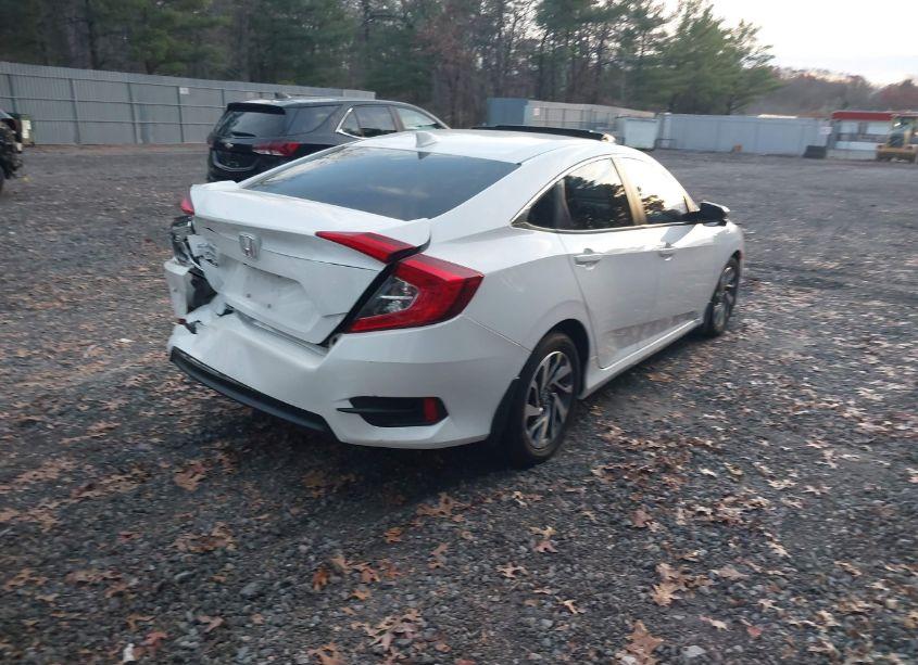 Photo 4 of 2018 Honda Civic EX (VIN 2HGFC2F77JH512399)