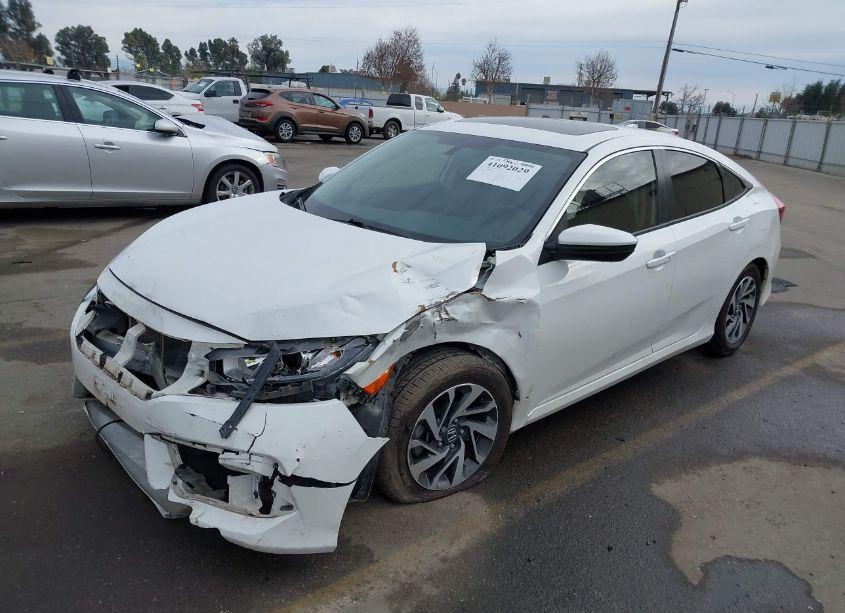 Photo 2 of 2018 Honda Civic EX (VIN 2HGFC2F77JH526514)