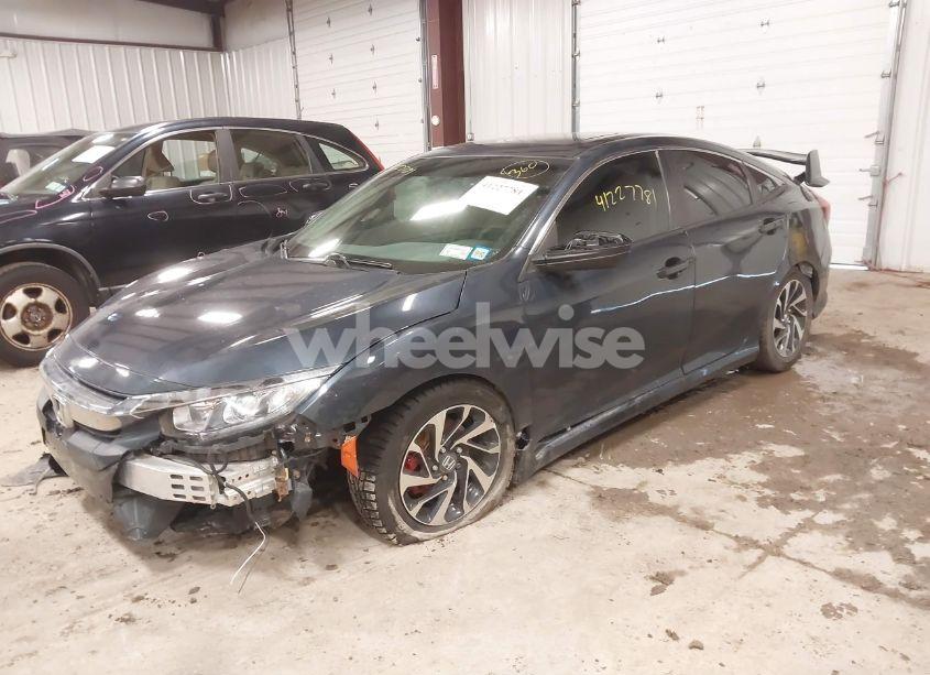 Photo 2 of 2018 Honda Civic EX (VIN 2HGFC2F77JH556239)