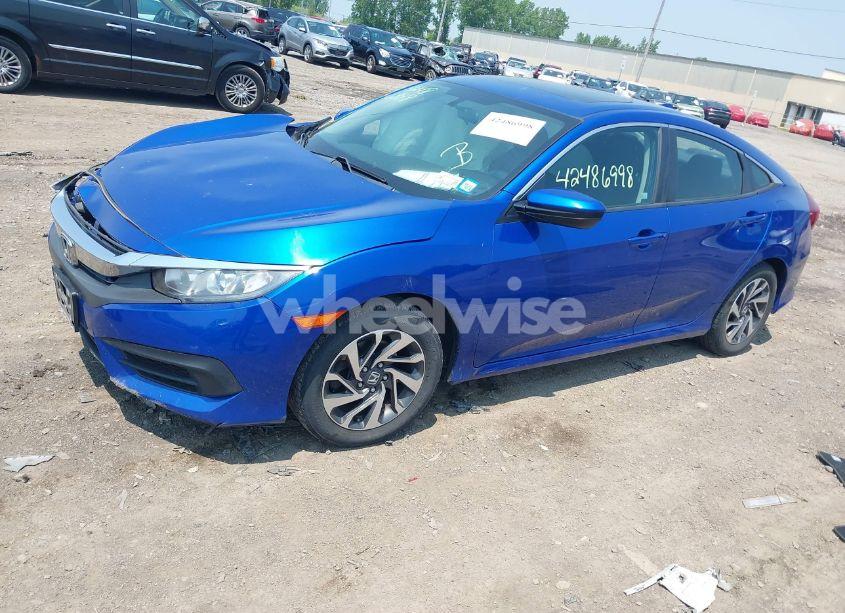 Photo 2 of 2017 Honda Civic EX (VIN 2HGFC2F7XHH557475)