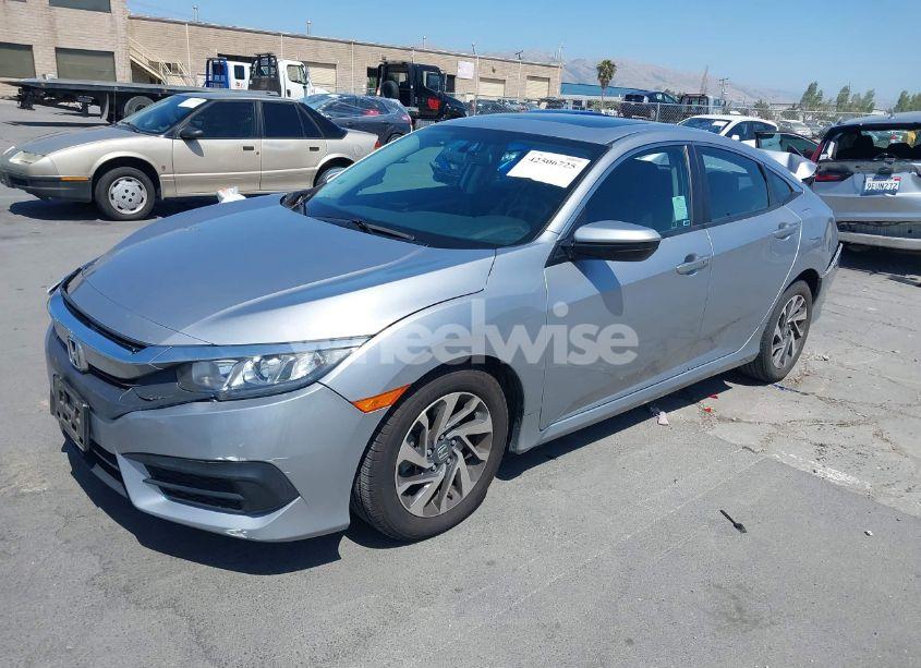 Photo 2 of 2018 Honda Civic EX (VIN 2HGFC2F7XJH513160)